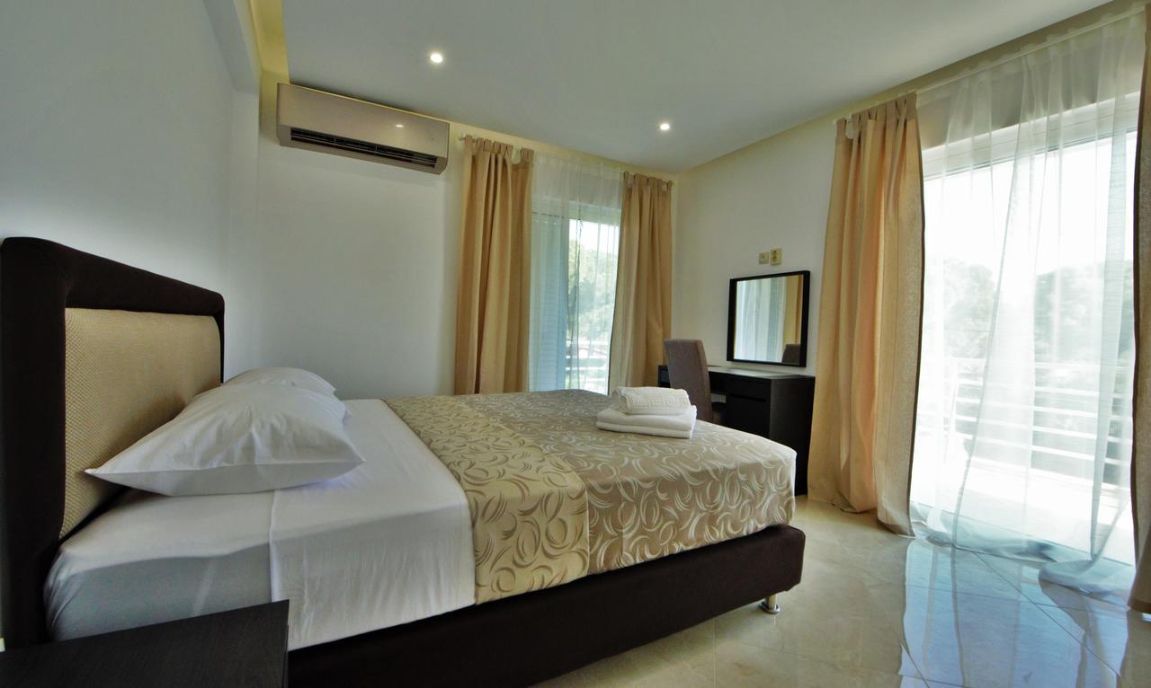 Athena Apartment Artemida  Esterno foto